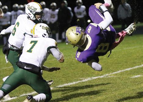 Polson Pirate quarterback Jarrett Wilson gets some tough yards.