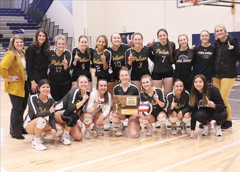 Members of the Polson volleyball divisional championship team are: (front) Sierra Perez, Clara Todd, Julia Barnard, Grace Simonich, Lucy Violett, Samantha Rensvold, Mgr. Tiana Walker, (back row) Asst. Coach Bonnie Klein, Head Coach Lizzy Cox, Avery Starr, Hannah Simpson, Vivian Lazaro, Carli Maley, Mckenna Hanson, Izzy Fyant, Mgr. Gabriella Llac, Mgr. Kellyn Nelson, Asst. Coach Mariah Newell.