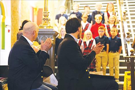 Gov. Gianforte and Director Brereton lead an applause for the St. Andrews Youth Choir at the Celebrate Adoption event at the State Capitol