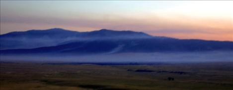 Smoke trails into the sunset in the West Garcon area.