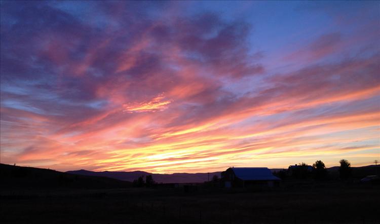 Brilliant colors fills the sky during a recent sunset captured on Back Road.