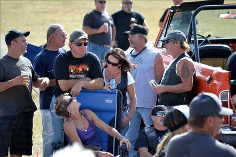 Crowds visit as they wait for the Dayton Daze parade to begin.