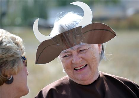 Donna Jacobson joined other ladies from her exercise group dressed as cattle that followed the chuck wagon in Dayton Daze parade.