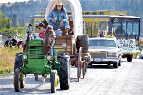 The parade made two passes around town and in front of judges at the Idle Spur Saturday at in Dayton. Dayton Daze is an annual fundraising event for Chief Cliff Volunteer Fire Department.