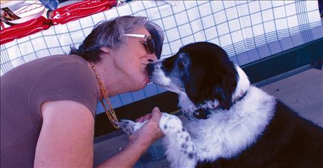 Doggy Dash best kisser Aussie kisses owner Lois Hart. Aussie also has a politician routine she performs.