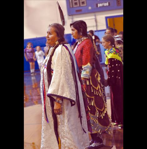 Aileen Plant leads the St. Ignatius Dance Troupe in a powwow performed for schoolchildren and Bavarian tourists. 