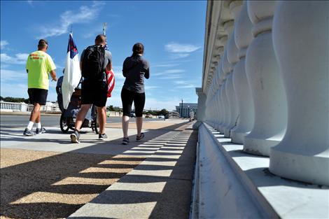 With less than a mile to go on his 3,300-mile journey, Lewis crosses the Arlington Memorial Bridge.